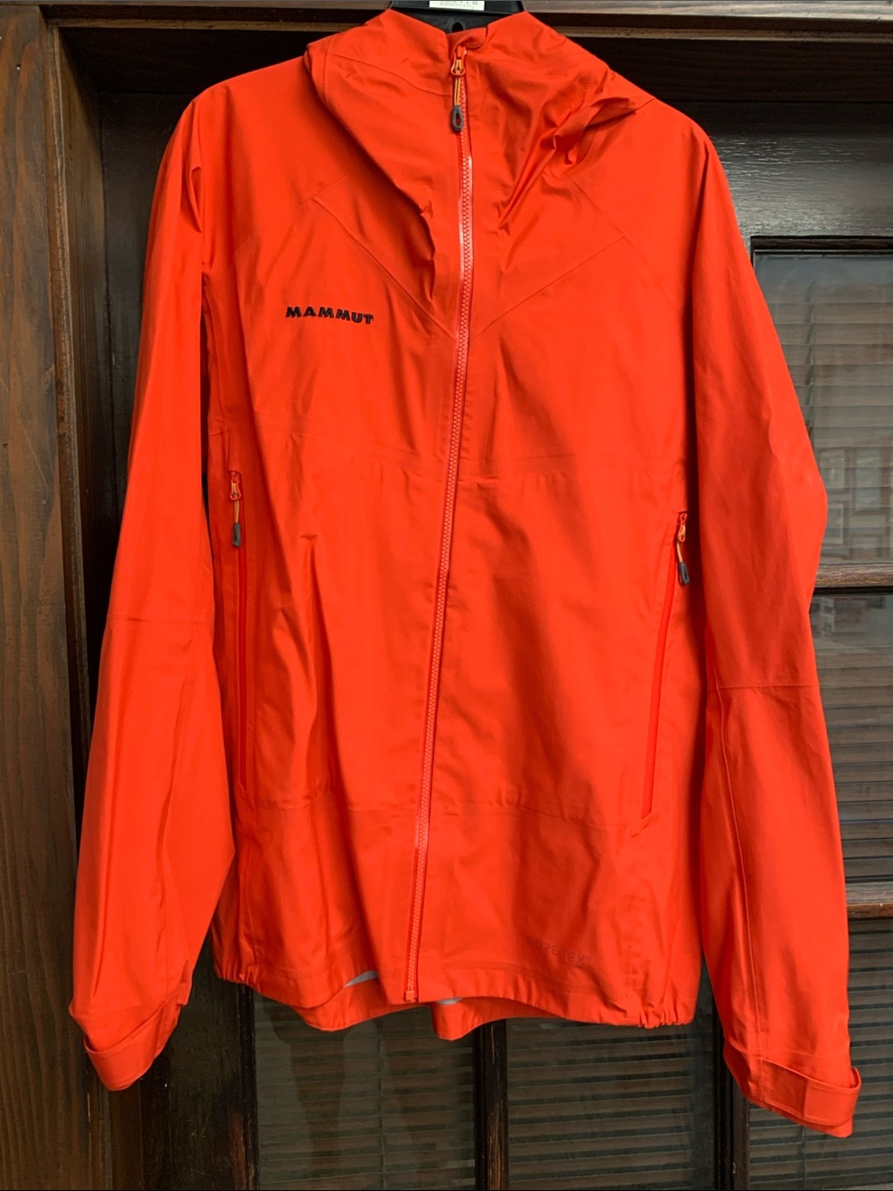 Mammut men’s hooded Alpine rain wind shell.